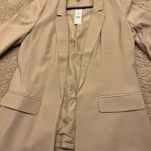 With tag tan loft blazer. Never used. Size 6 90% rayon